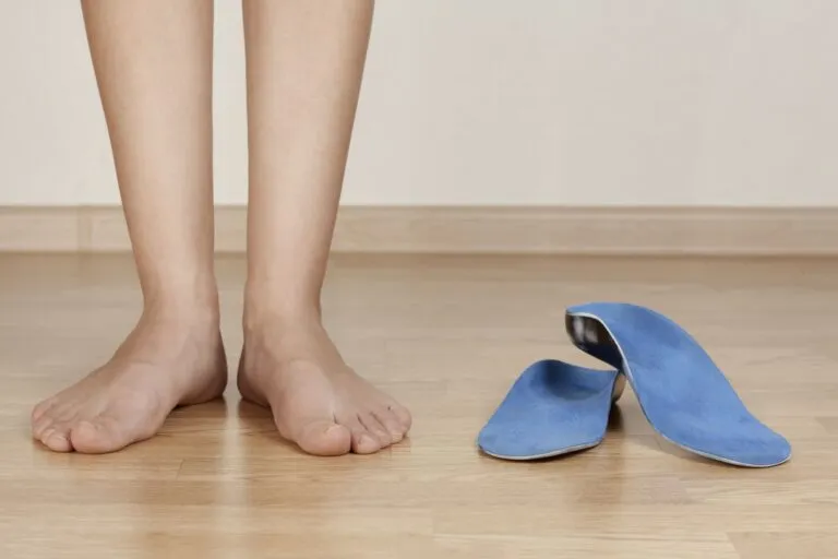 Custom orthotic insoles cast to a patient’s feet for posture support